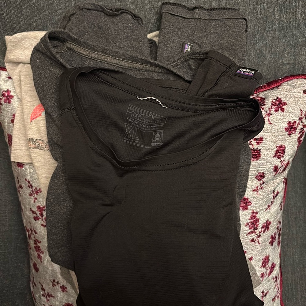 (2) men XL Patagonia shirts.